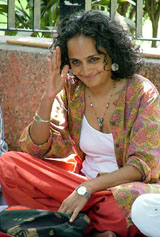 Author Arundhati Roy participates in a public hearing of people displaced by the Sardar Sarovar Dam during the fifth day of a fast by leader of the Narmada Bachao Andolan Medha Patekar in New Delhi on Sunday