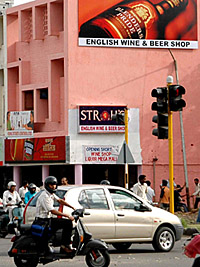 A huge billboard displays an advertisement for a liquor company under the new policy near the traffic lights of Sector 27 in Chandigarh.