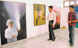 A visitor at an exhibition held by Som and Rozy Varinder Kaur at Sector 11, Chandigarh, on Sunday.