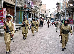 Pakistani paramilitary soldiers patrol the streets of Miranshah, the main town in North Waziristan on Monday.  Five persons, were killed in a landmine blast and two pro-Taliban militants died in a clash with security forces in Pakistan's restive tribal region on Monday, an official said