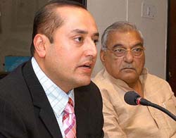 Sabeer Bhatia of Hotmail speaks to mediapersons in Chandigarh on Tuesday about setting up a Knowledge City in Haryana, to be known as Nano City, as Chief Minister Bhupinder Singh Hooda looks on