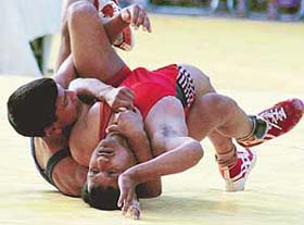 A bout in progress during the Gulzar Gold Cup Inter Club Wrestling competition held at Sarda Sarvhitkari Senior Secondary School, Sector 40, Chandigarh