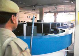 An SBI branch wears a deserted look as the employees strike enters its third day in Ludhiana on Wednesday. 