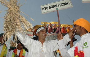 Singer Lucky Ali (left) shouts anti-World Trade Organisation (WTO) slogans as he joins agitating farmers during a protest rally, organised by international aid agency Oxfam, in New Delhi on Thursday.
