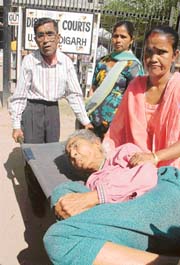 Ms Ved Kumari Mehta, 90-year-old bedridden widow, who came to the court in connection with tenant eviction case filed by her. 