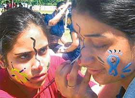 Girls participate in paint the face competition as a part of the 27 th founders day celebrations of YPS, Mohali, on Friday.