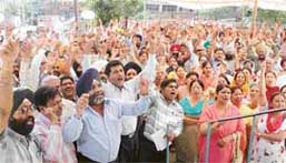 Employees of public sector banks observe a dharna in support of State Bank of India employees in Ludhiana on Friday.