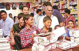 Booksellers do brisk business as a large number of parents visit shops to buy textbooks for their wards for the new academic session, in Chandigarh on Saturday.