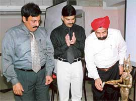 Dr Iqbal Ahuja lights the lamp at the inauguration of Sankyo Jizo.