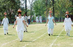The chatti race in progress during the 23rd annual sports day meet of the Dev Samaj College of Education, Sector 36, Chandigarh, on Saturday.