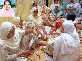 Women mourn the death of Gurbax Kaur (inset) in Bhattian village on Saturday. 