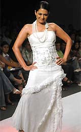 Mandira Bedi displays a creation by Priya Awasthy on the last day of the Wills Lifestyle India Fashion Week in New Delhi