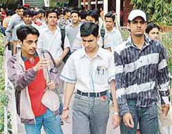 Students after taking IIT exam at one of the centres in Chandigarh on Sunday.
