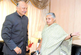 Delhi Chief MInister Sheila Dikshit meet with Union Minister of Power Sushil Kumar Shinde at his office in the Capital on Monday.