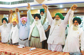 Leaders of different farmers' organisations join hands to launch a movement against the import of wheat in the country in Ludhiana