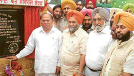 Mr Jagjit Singh, Minister for Local Government, inaugurates a sewerage and water supply project at Mullanpur Dhaka on Monday