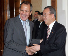 Russian Foreign Minister Sergei Lavrov and South Korean Foreign Affairs and Trade Minister Ban Ki-moon share a joke as they meet in Moscow on Monday