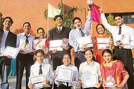 Students of the Dr Ambedkar Institute of Hotel Management, Catering and Nutrition, Sector 42, in jubilant mood after the prize distribution function at the institute in Chandigarh on Tuesday.