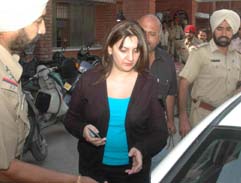 Suman Sahni after being arrested from a five-star hotel in Jalandhar on Tuesday. 