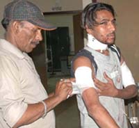 Jeewan, an under trial at the Jalandhar Central Jail, receiving medical aid at the Civil Hospital in Jalandhar on Tuesday.