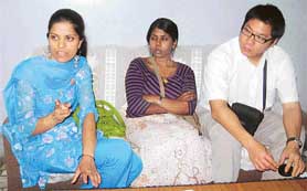 Ms Neena Randhawa, Ms Uma Selvarajah and Mr Khaik Kee Peh, MBBS students of Warwick Medical University, West Midland, UK, at Mandi Ahmedgarh on Tuesday.