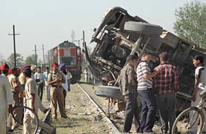 The damaged truck after being hit by a train at an unmanned railway crossing in Jalandhar Cantonment on Wednesday.