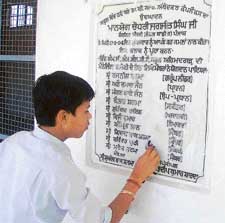 A student of MGMN Senior Secondary School, Mandi Ahmedgarh, cleans memorial stone of Dr B.R Ambedkar Complex on Thursday