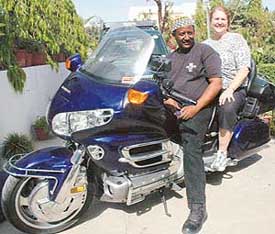 Khalil and Robin Diallo pose on their 1800-cc Honda Gold Wing on their visit to Chandigarh on Friday.
