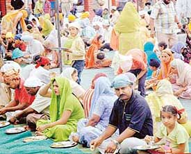 Langar organised on Baisakhi at Sector 40-C Gurdwara on Friday.