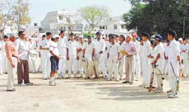 Boys during the trials conducted by the Ludhiana District Cricket Association at the Arya College grounds in Ludhiana on Friday