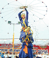 Participants display their skills at the first national gatka competition at Gurdwara Sand Aditha Sahib, Lambian, Mohali, on Saturday. 