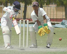 Karan of Chandigarh in action during their cricket match against Sangrur at DAV School, Sector 8, Chandigarh, on Saturday.