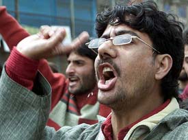 Kashmiris raise anti-police slogans in Srinagar during a protest against the arrest of Arif Shah for his alleged involvement in Fridays blasts. The protesters claimed that he was a student and not a militant