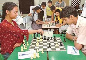 Jasleen and Anshudir make their moves during the Tender Heart Chess Championship at Tender Heart School in Chandigarh