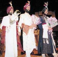 Sikh men in resplendent headgear at a cultural show