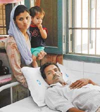 Balwinder Singh, who was allegedly tortured in police custody, under treatment in the Civil Hospital at Ludhiana on Sunday