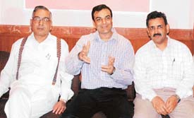 Mr Sandeep Jain, Executive Director of Oswal Woollen Mills Ltd, addresses a press conference in Ludhiana