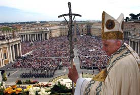 Pope Benedict XVI arrives on a balcony to deliver his Easter benediction in Saint Peters Square, the Vatican, on Sunday