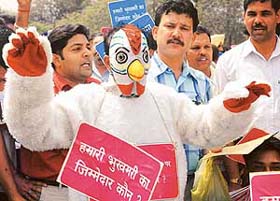 Poultry farmers hold a protest march in Chandigarh on Monday