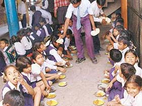 Students being served cooked mid-day meal at Government Senior Secondary School, Sector 45, Chandigarh