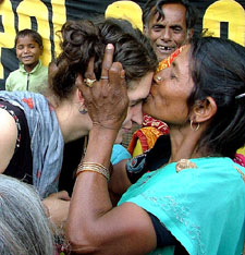 Bridget Hanna, a US activist who supported the Bhopal gas victims movement, is blessed by a Bhopal gas victim after the Prime Ministers assurance on their demands, at Jantar Mantar in New Delhi on Monday