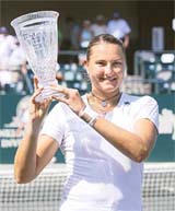 Nadia Petrova of Russia holds up the championship trophy after defeating Patty Schnyder of Switzerland 6-3, 4-6, 6-1