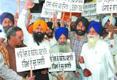 Members of the Khalsa Mission Organisation take out a Chetna March against the menace of drug addiction, in Jalandhar on Tuesday.