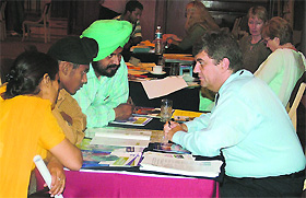 Coordinators of the education fair, organised by the IDP Education Australia, counsell students at a hotel in Jalandhar on Tuesday