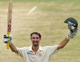 Jason Gillespie of Australia celebrates after scoring a century during the third day of the second Test between Bangladesh and Australia in Chittagong on Tuesday