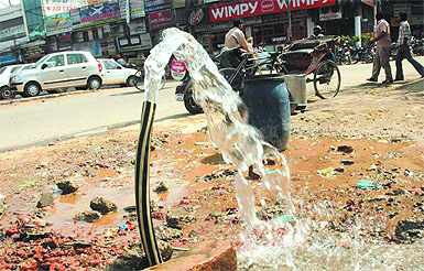 Photographer Pawan Sharma clicks precious water going waste near the bus stand in Jalandhar on Thursday