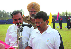 CRPF officers prompt Samresh Jung to read out the oath