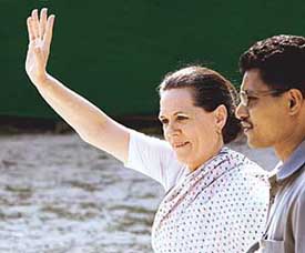 Congress party president Sonia Gandhi greets the crowd during an election rally in Baduria, some 70 north of Kolkata, on Thursday