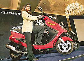 Managing Director of Kinetic Motor Company Limited Sulajja Firodia Motwani poses for photographers