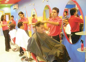 Harbhajan Mann getting his streaks styled at the recently opened Sylvies Colour caf, Mohali